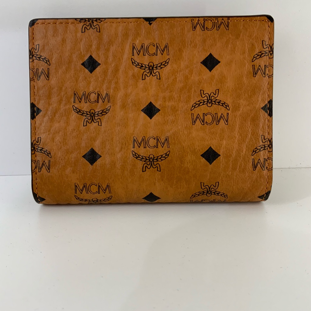 Pre Owned Mcm Cognac Monogram Bifold Wallet With Chain & Box.